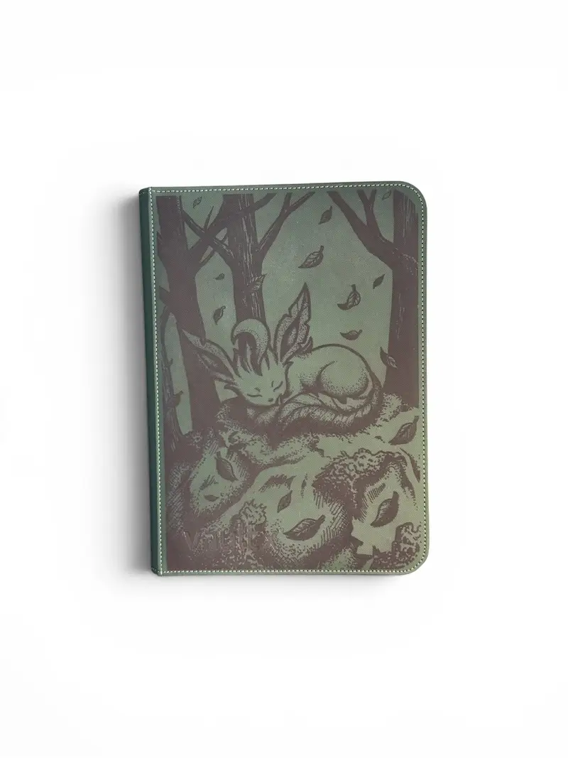 Dark green binder engraved with a sleeping Leafeon-inspired figure on a rock, falling leaves, and the title Forest Sleep.